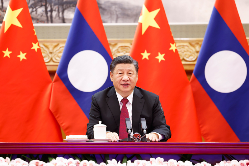12月3日，中共中央总书记、国家主席习近平在北京同老挝人民革命党中央总书记、国家主席通伦举行视频会晤。新华社记者 黄敬文 摄